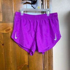 Purple Nike athletic shorts